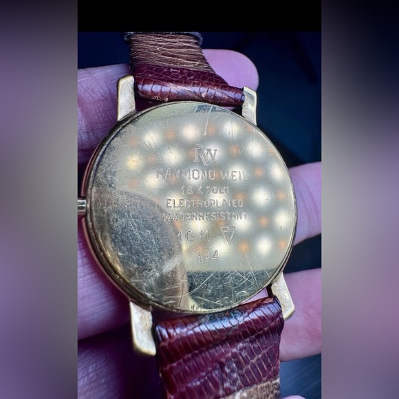This absolutely gorgeous vintage Raymond Weil watch from  Raymond Weil 114 Electroplated 18k Gold Watch